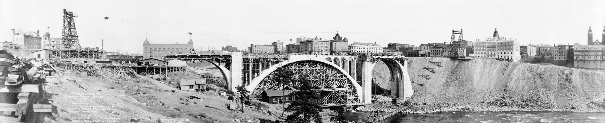 Falsework centering in the center arch of Monroe Street Bridge, Spokane, Washington, 1911. An elaborate wooden structure is supporting concrete until it can self-stand.